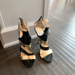 Authentic Jimmy Choo Black and Gold Pumps